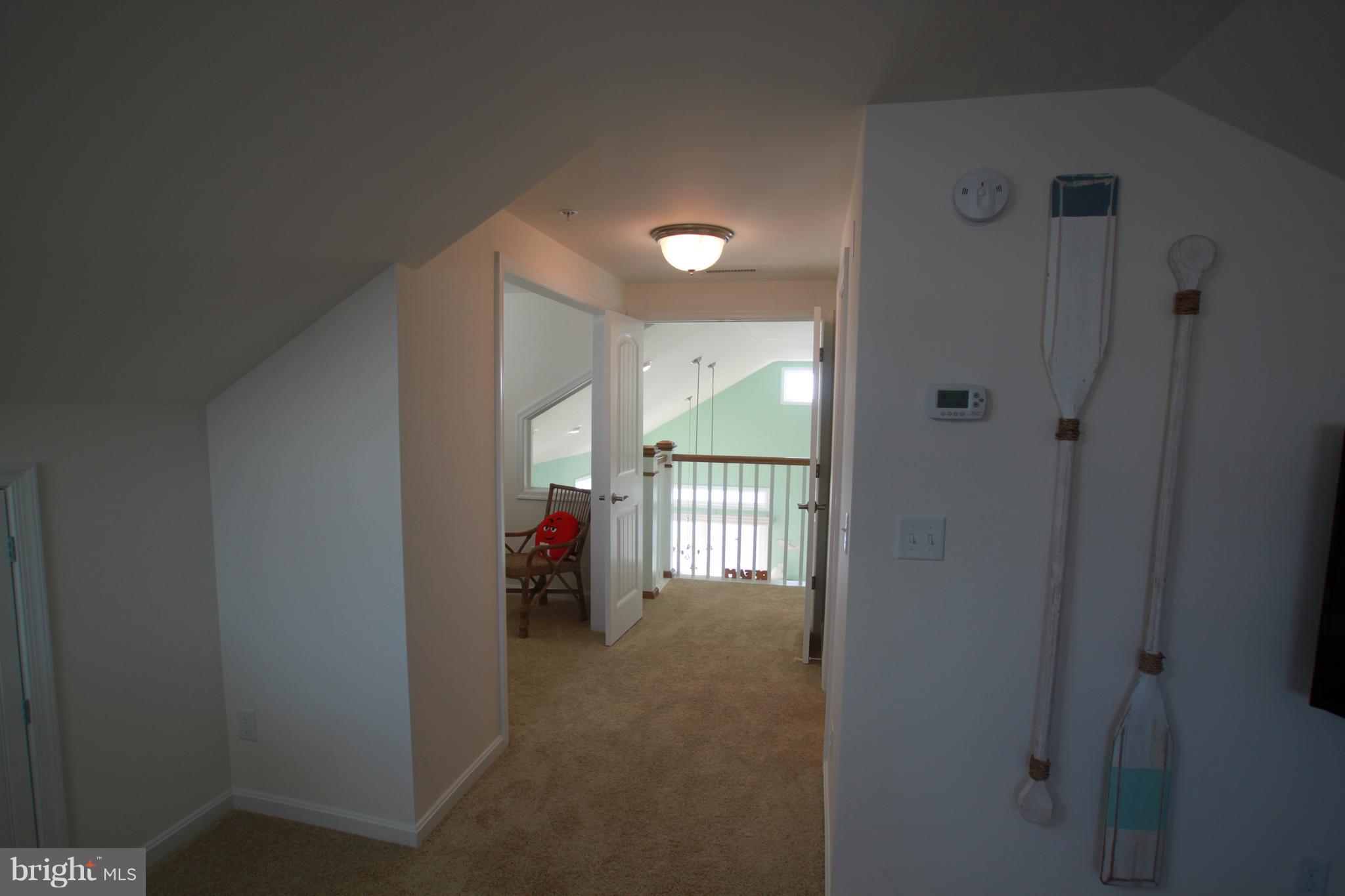 163 Pine Tree Road Ocean City, MD 21842 - Photo 35 of 57 Hall from 2nd fl br. Office on left, bath on rt