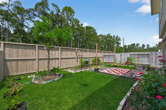a view of street with flower plants