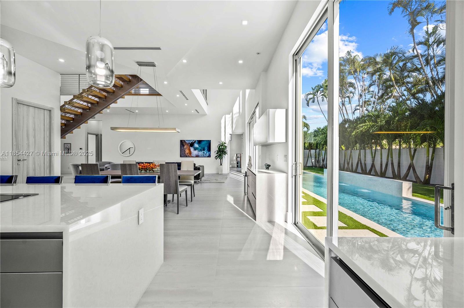 2628 Marcinski Road Jupiter, FL 33477 - Photo 24 of 70 a view of a living room and kitchen
