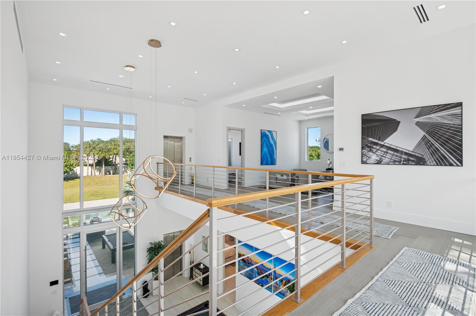 2628 Marcinski Road Jupiter, FL 33477 - Photo 27 of 70 a living room with furniture and a flat screen tv