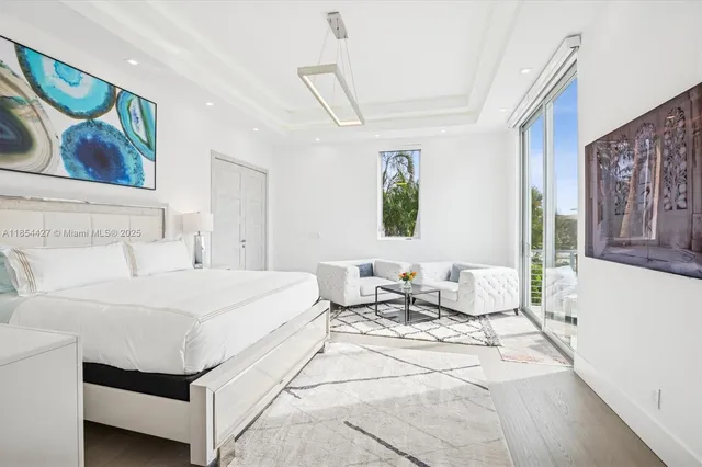 a couple of white appliances sitting next to a white cabinet
