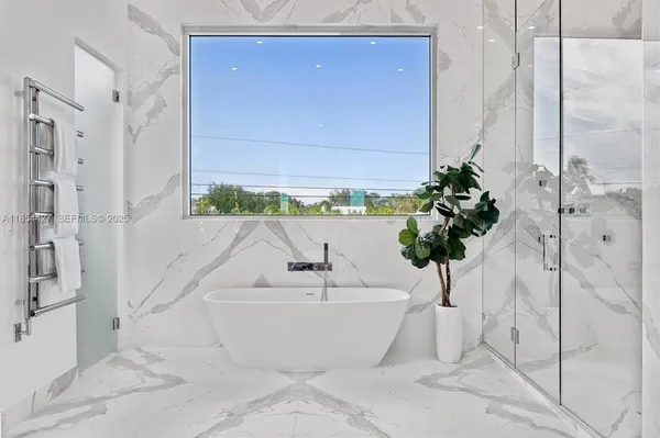 a bathroom with a toilet sink vanity and mirror