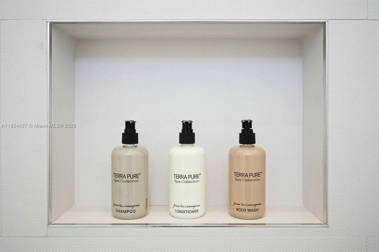 2628 Marcinski Road Jupiter, FL 33477 - Photo 39 of 70 a couple of white appliances sitting next to a white cabinet