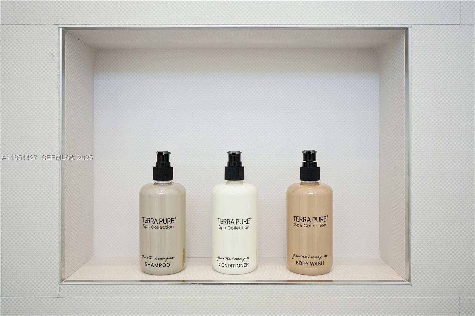 2628 Marcinski Road Jupiter, FL 33477 - Photo 39 of 70 a couple of white appliances sitting next to a white cabinet