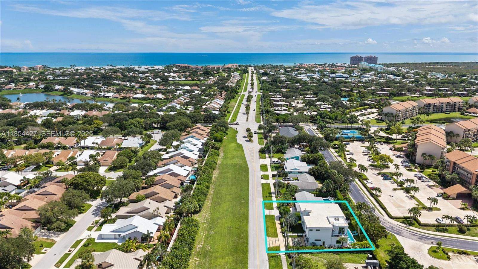 2628 Marcinski Road Jupiter, FL 33477 - Photo 66 of 70 an aerial view of residential building and ocean