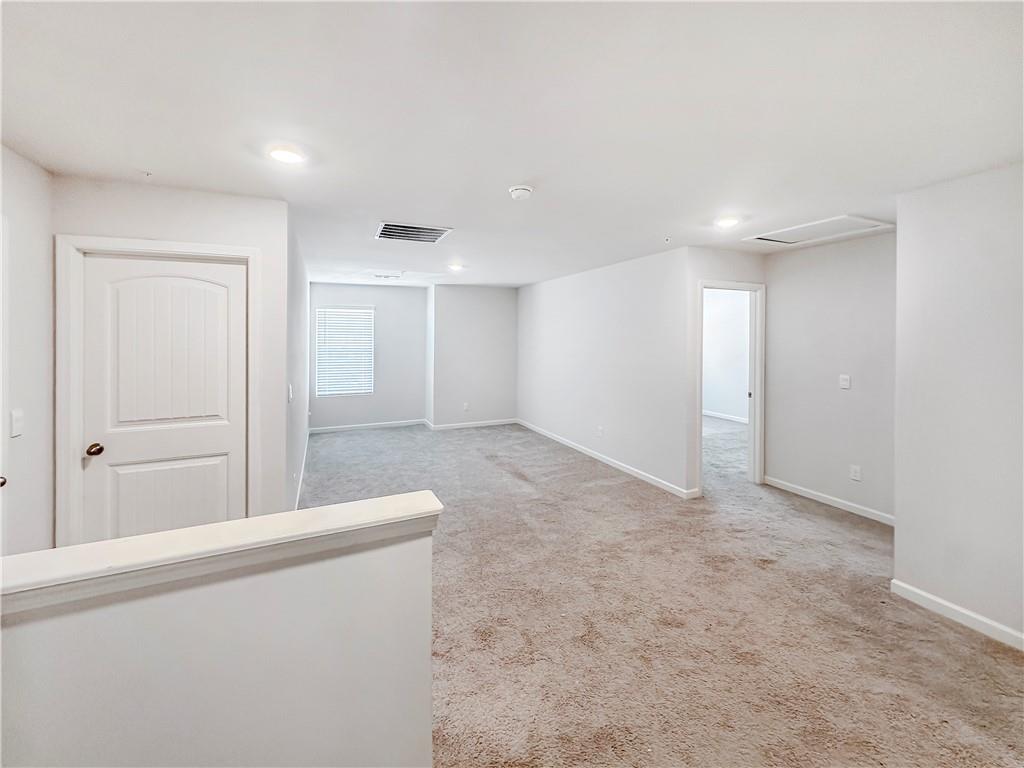 965 Athena Bend Fairburn, GA 30213 - Photo 18 of 37 a view of an empty room