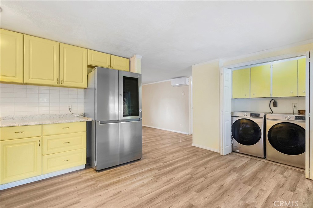 3156 Esplanade, Unit 292 Chico, CA 95973 - Photo 17 of 32 a kitchen with a refrigerator sink and cabinets