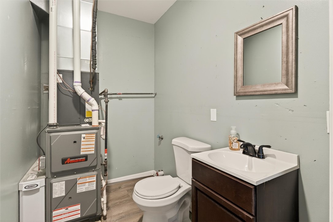 5681 Walworth Road Ontario, NY 14519 - Photo 40 of 48 Garage space half bath & furnace