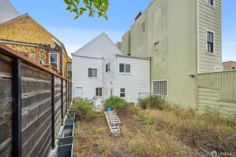a view of a backyard with plants