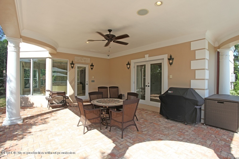 300 Dunbar Road Palm Beach, FL 33480 - Photo 11 of 14 a living room with furniture and a large window