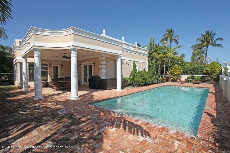 300 Dunbar Road Palm Beach, FL 33480 - Photo 12 of 14 a view of a house with a backyard