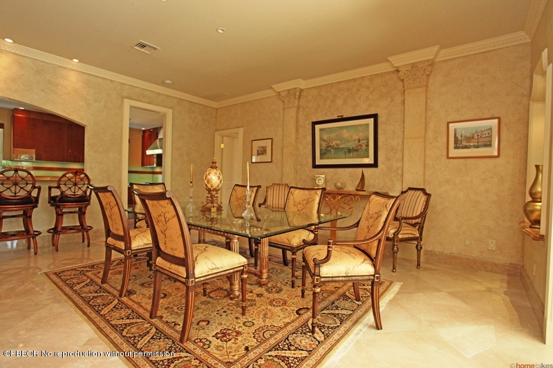 300 Dunbar Road Palm Beach, FL 33480 - Photo 5 of 14 a view of a livingroom and dining room with furniture