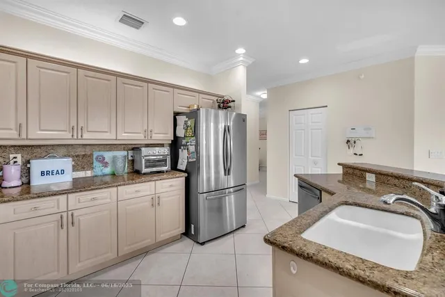 a bathroom with a toilet a sink and a mirror