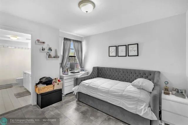 a view of a backyard with wooden floor and barbeque oven