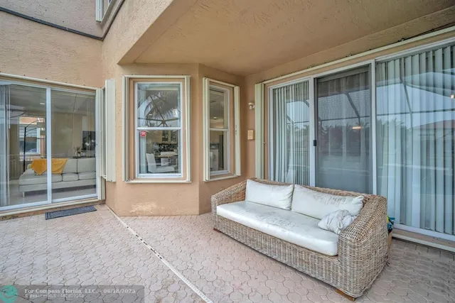 a view of a lake with houses in the back