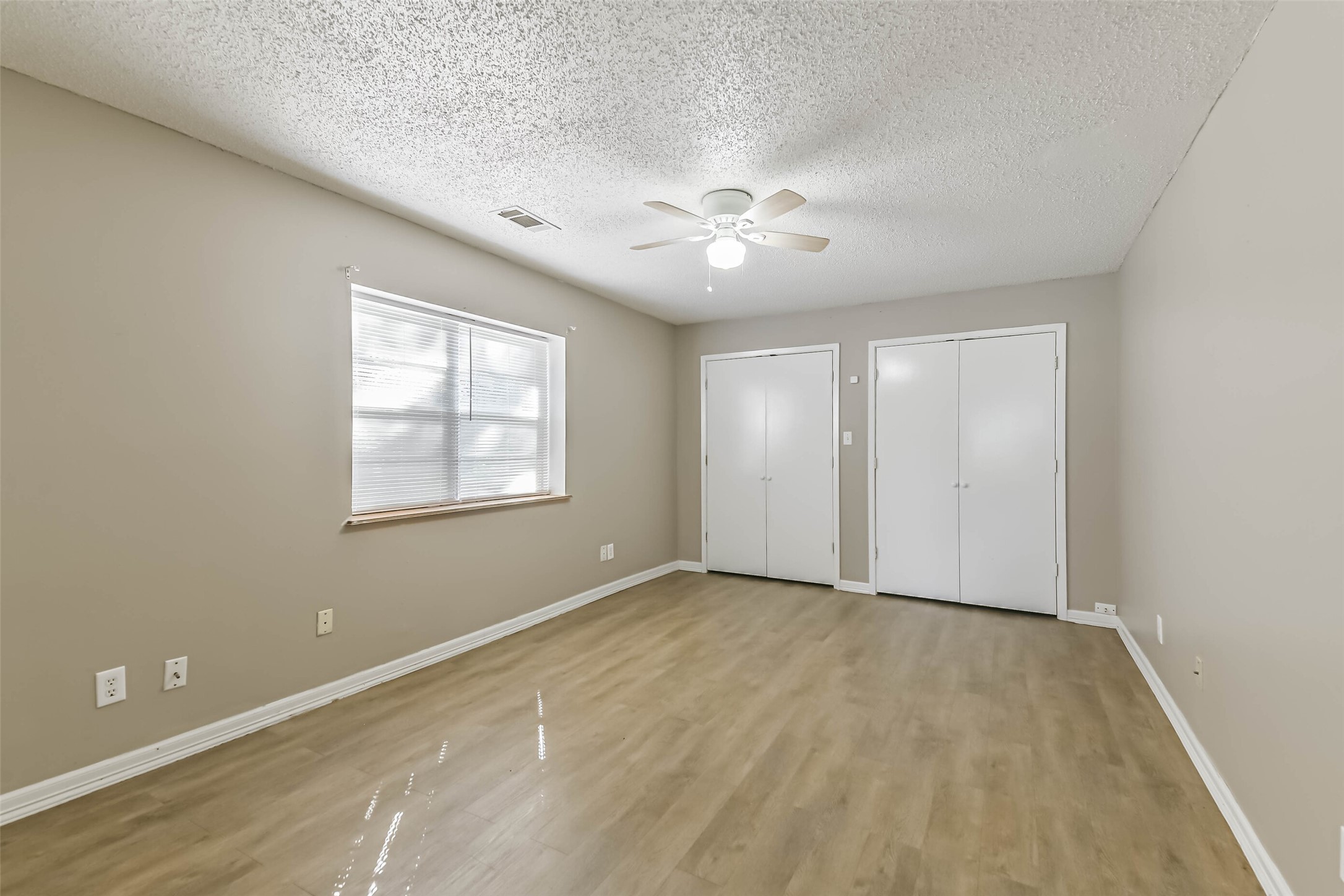 4869 Fm 2518 Cleveland, TX 77327 - Photo 20 of 41 a view of an empty room with a window