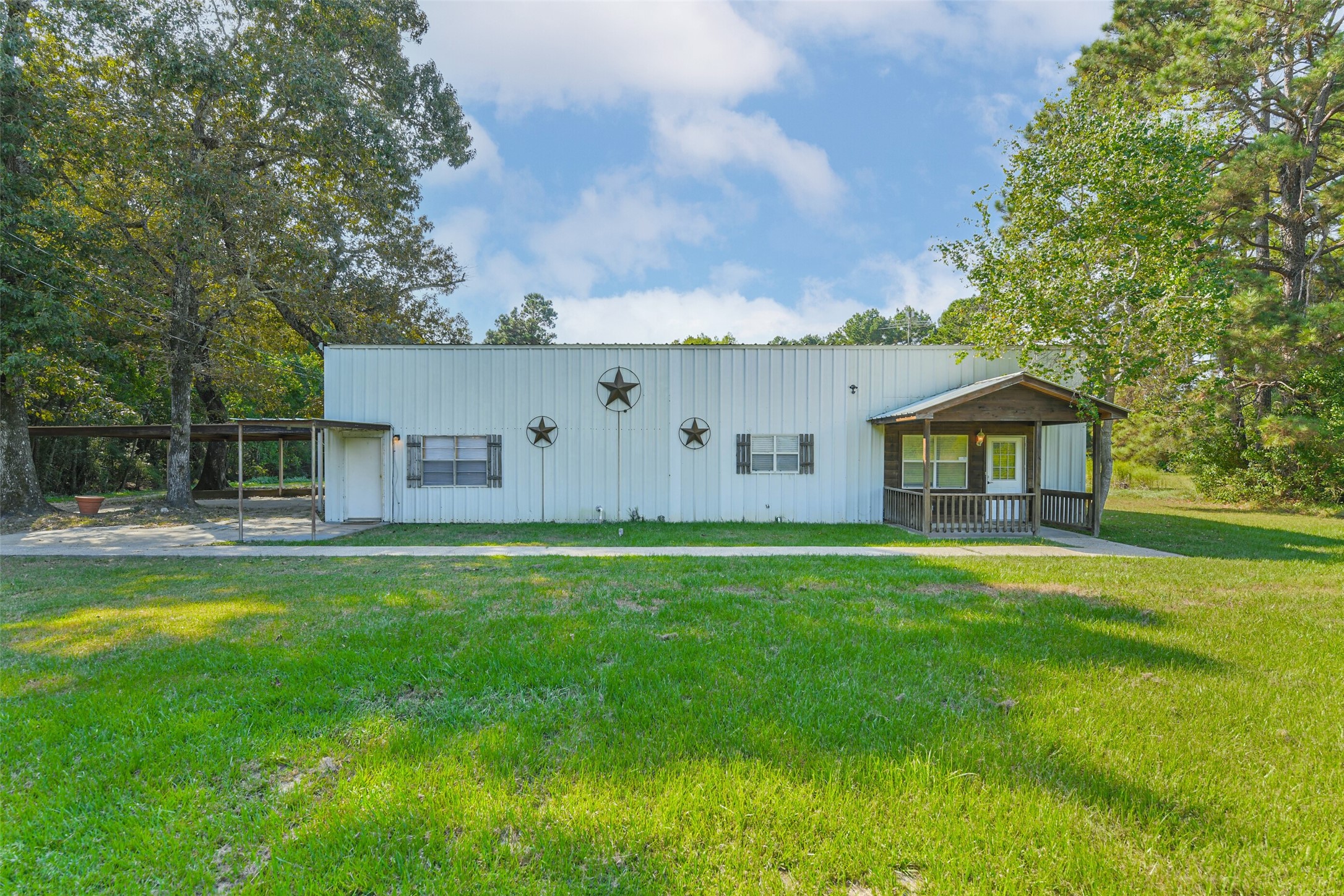 4869 Fm 2518 Cleveland, TX 77327 - Photo 6 of 41 a view of a house with backyard and a tree