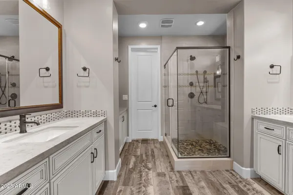 a kitchen with a stove a sink and a refrigerator