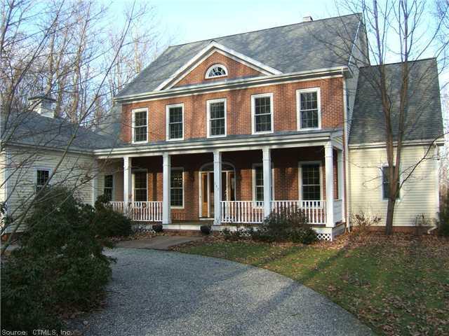 547 Boston Post Road East Lyme, CT 06333 - Photo 1 of 1 a front view of a house with a yard and trees