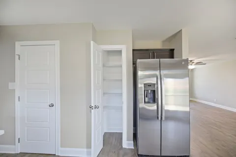 a view of an empty walk in closet