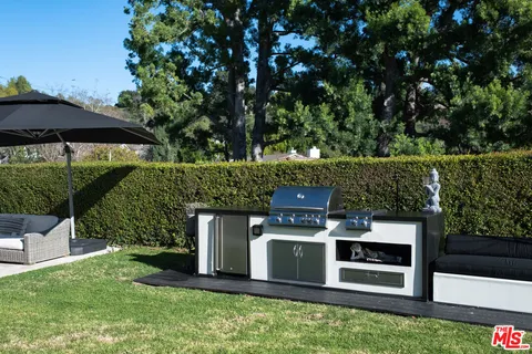 a view of a wooden fence and a bench