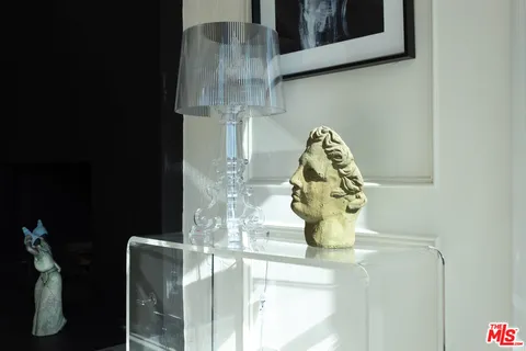 a vase of flowers sitting on a table