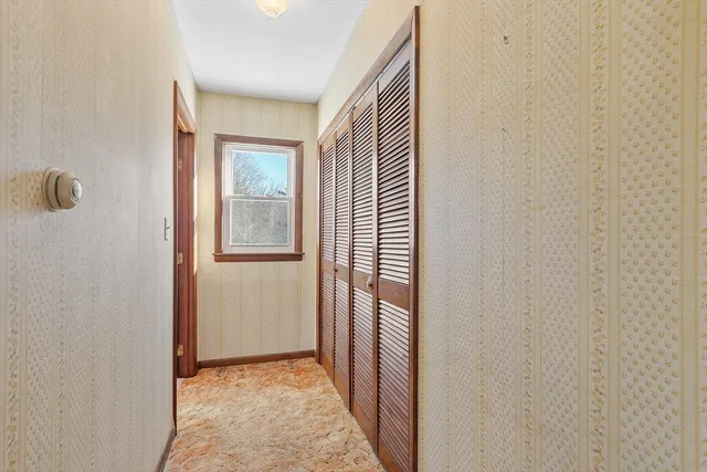 an empty room with windows