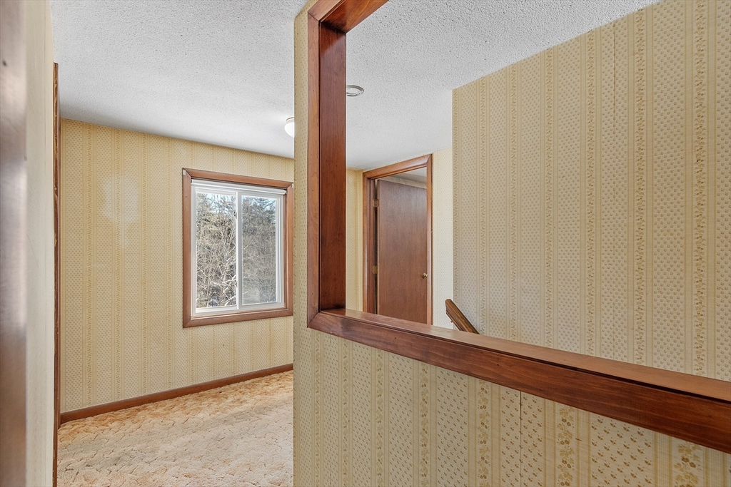 318 Lovewell Street Gardner, MA 01440 - Photo 34 of 42 a view of an empty room and window