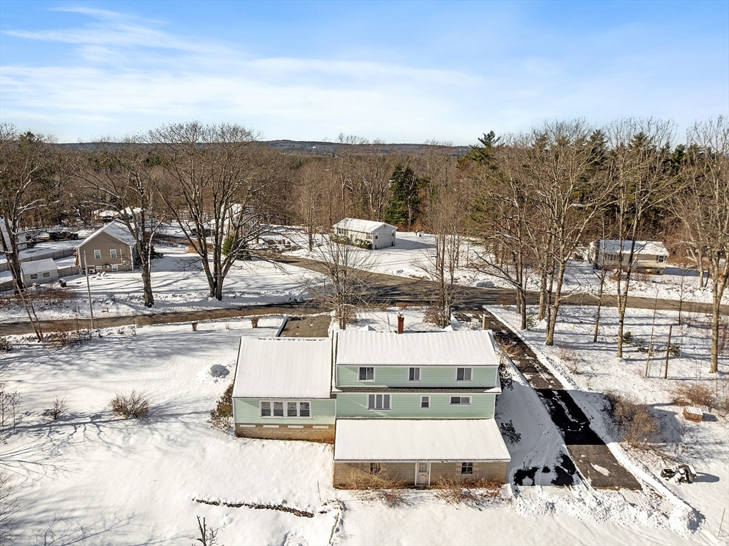 318 Lovewell Street Gardner, MA 01440 - Photo 8 of 42 a view of a house with a yard