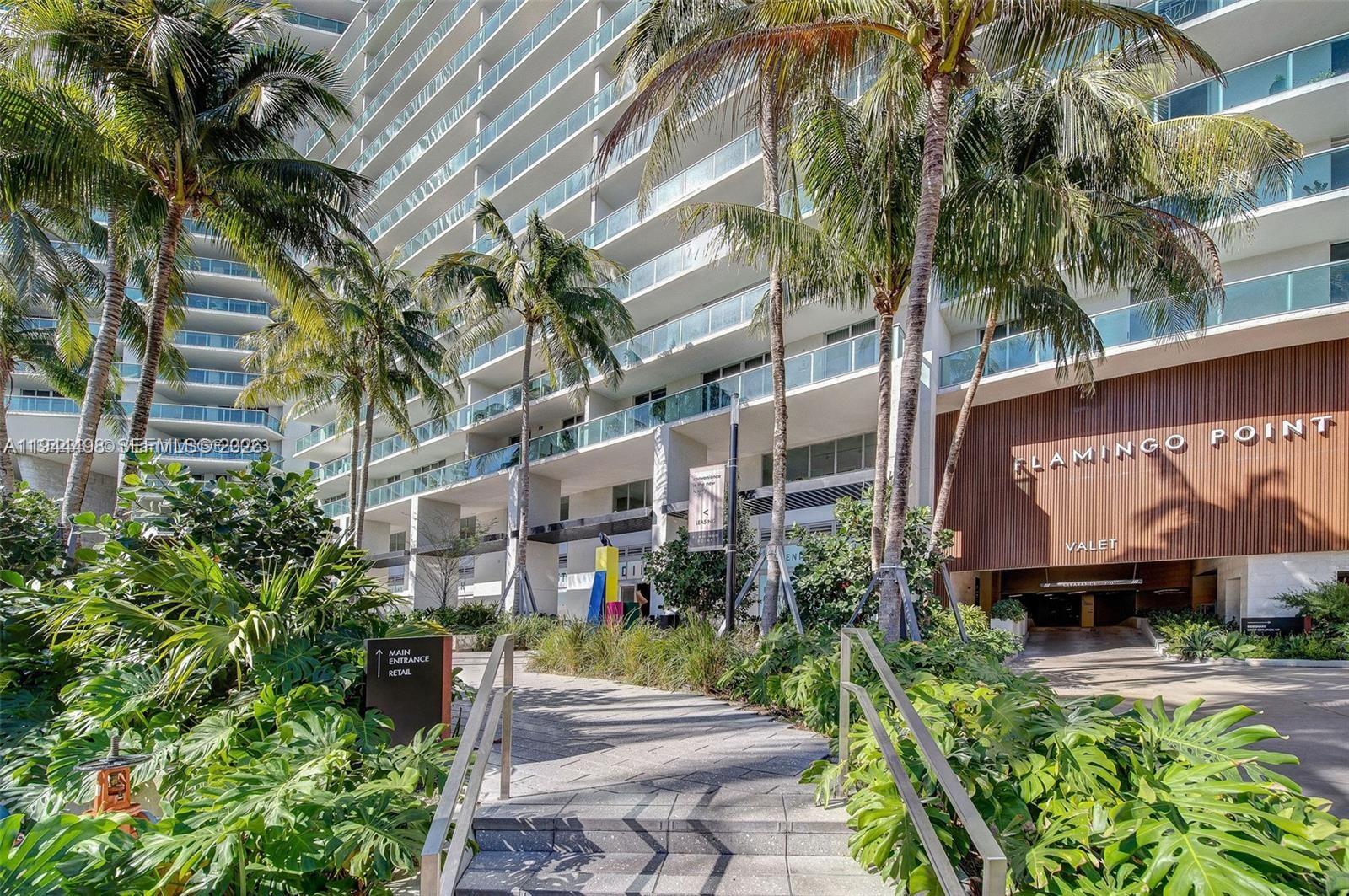 1500 Bay Road, Unit 458S Miami Beach, FL 33139 - Photo 17 of 41 a view of a street with potted plants and palm trees