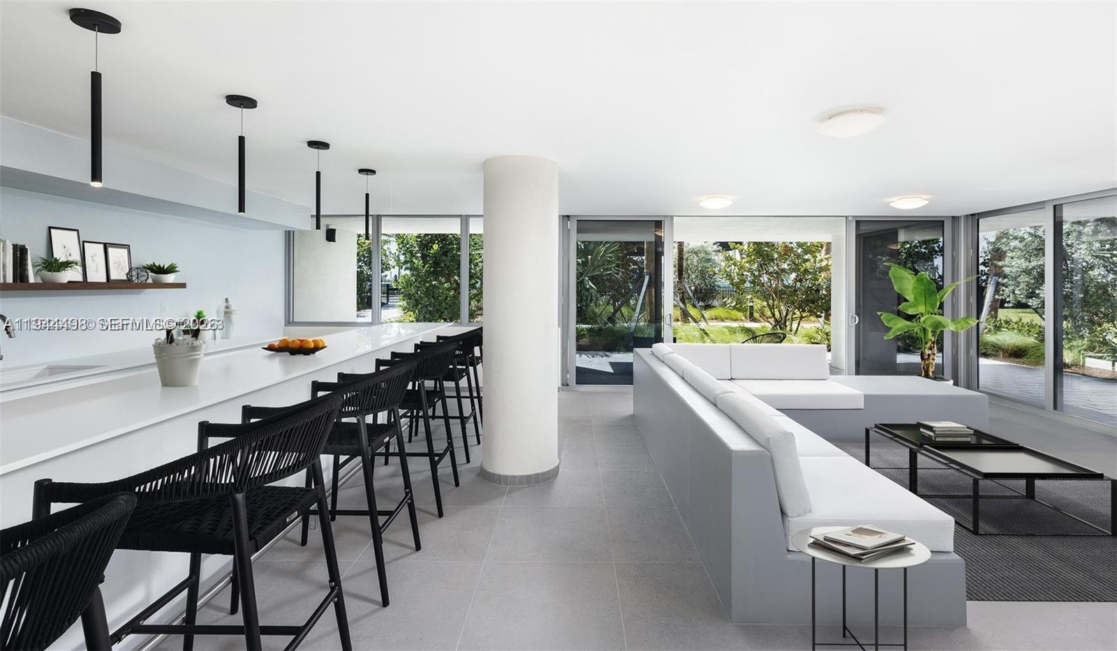 1500 Bay Road, Unit 458S Miami Beach, FL 33139 - Photo 21 of 41 a view of a dining room with furniture window and outside view