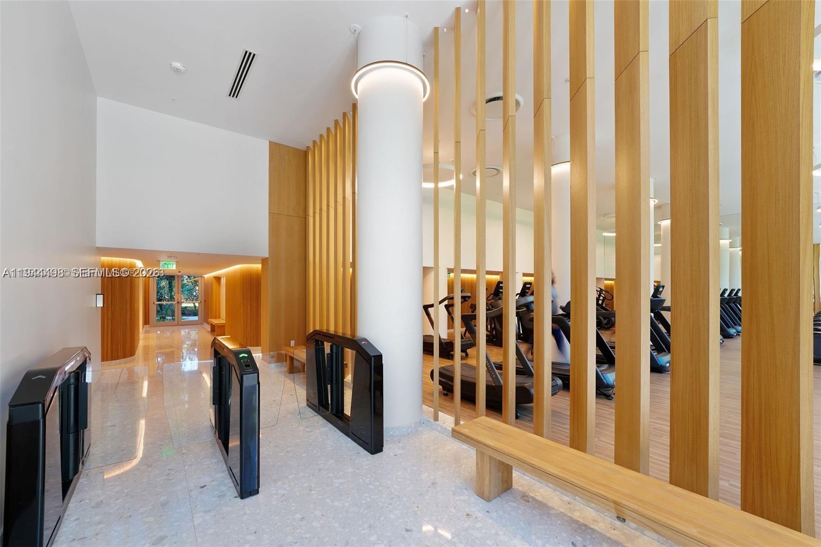 1500 Bay Road, Unit 458S Miami Beach, FL 33139 - Photo 23 of 41 a view of a hallway with windows