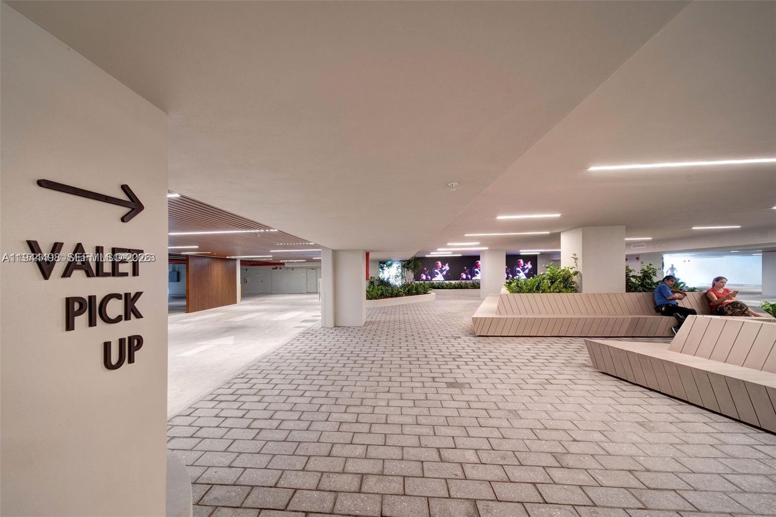 1500 Bay Road, Unit 458S Miami Beach, FL 33139 - Photo 40 of 41 a view of a livingroom with furniture and window