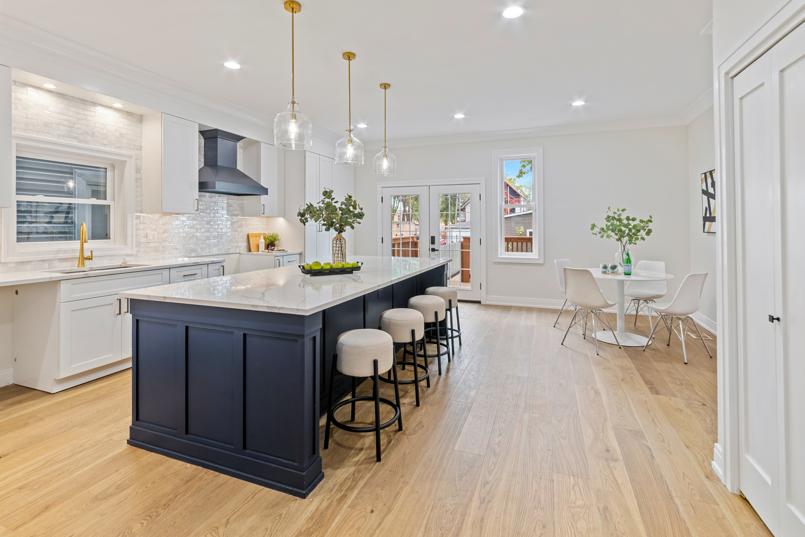 1622 North Spaulding Avenue Chicago, IL 60647 - Photo 13 of 50 a large kitchen with lots of counter space and furniture