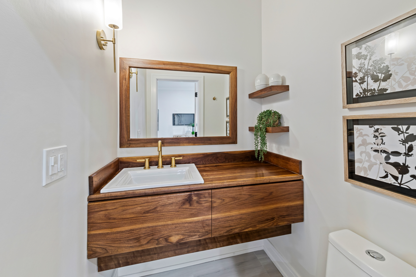 1622 North Spaulding Avenue Chicago, IL 60647 - Photo 24 of 50 a bathroom with a sink and a mirror