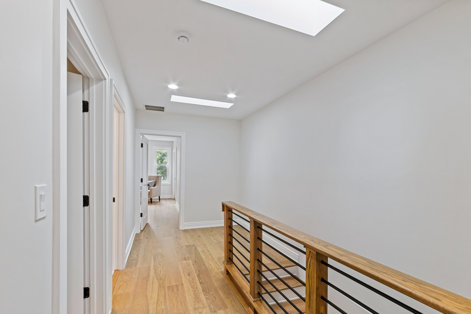 1622 North Spaulding Avenue Chicago, IL 60647 - Photo 28 of 50 a view of a hallway with wooden floor and staircase