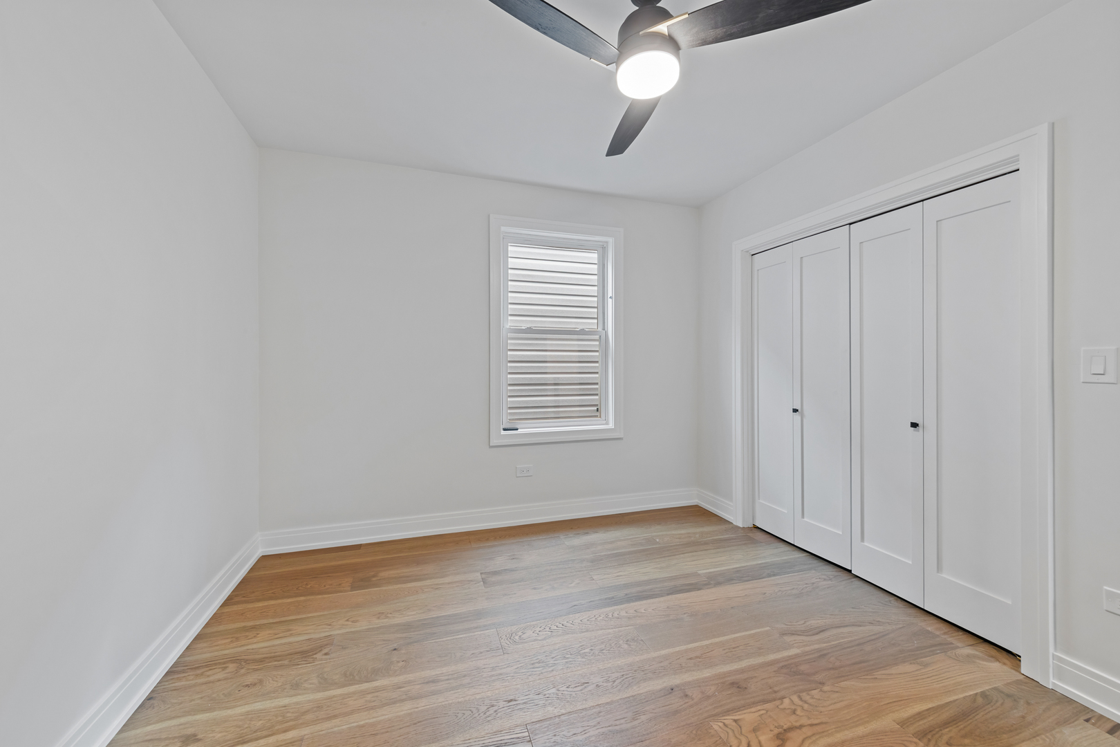 1622 North Spaulding Avenue Chicago, IL 60647 - Photo 29 of 50 wooden floor in an empty room with a window