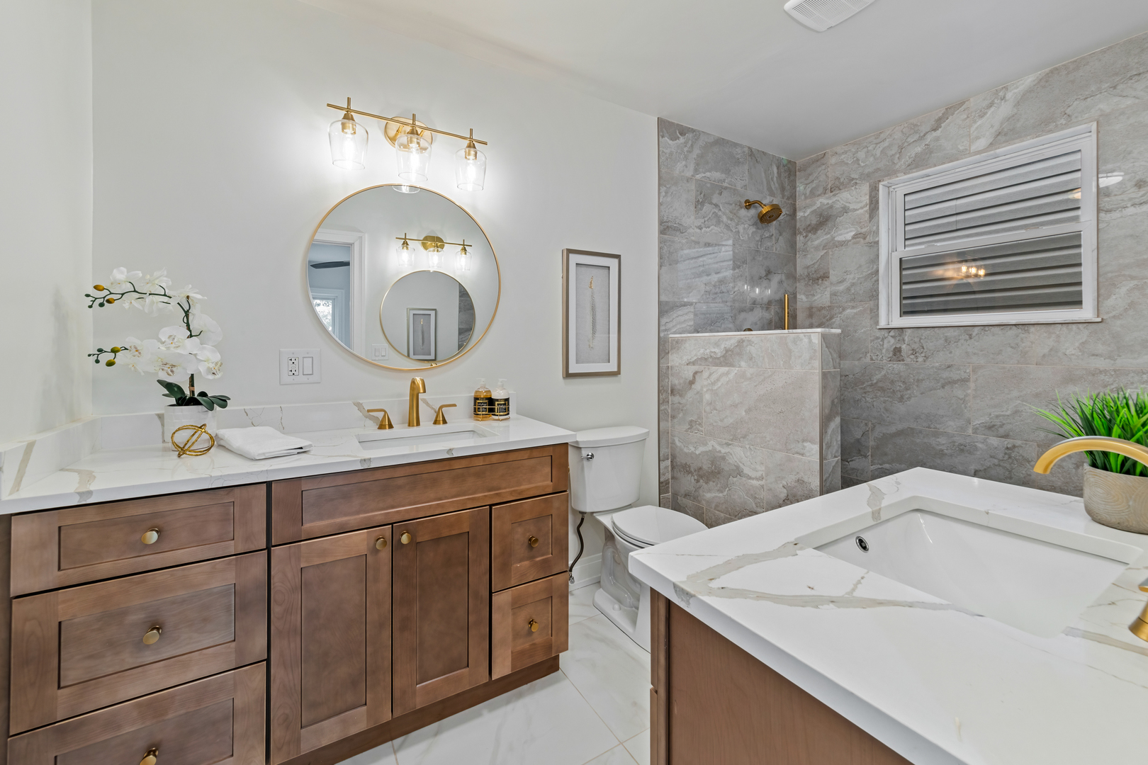 1622 North Spaulding Avenue Chicago, IL 60647 - Photo 33 of 50 a bathroom with a sink and a mirror