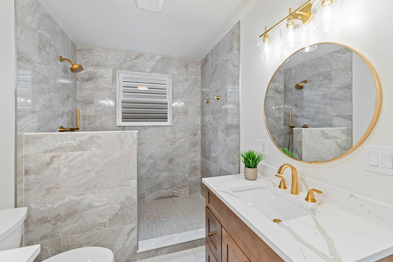 1622 North Spaulding Avenue Chicago, IL 60647 - Photo 34 of 50 a bathroom with a sink and a mirror