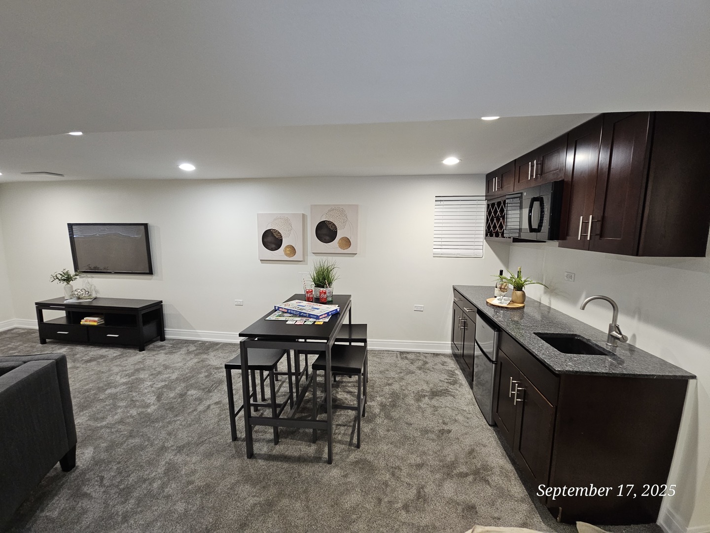 1622 North Spaulding Avenue Chicago, IL 60647 - Photo 38 of 50 a kitchen with stainless steel appliances granite countertop a sink a stove and a refrigerator
