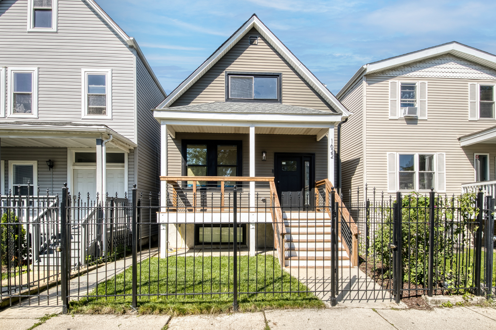 1622 North Spaulding Avenue Chicago, IL 60647 - Photo 50 of 50 a view of a brick house with large windows