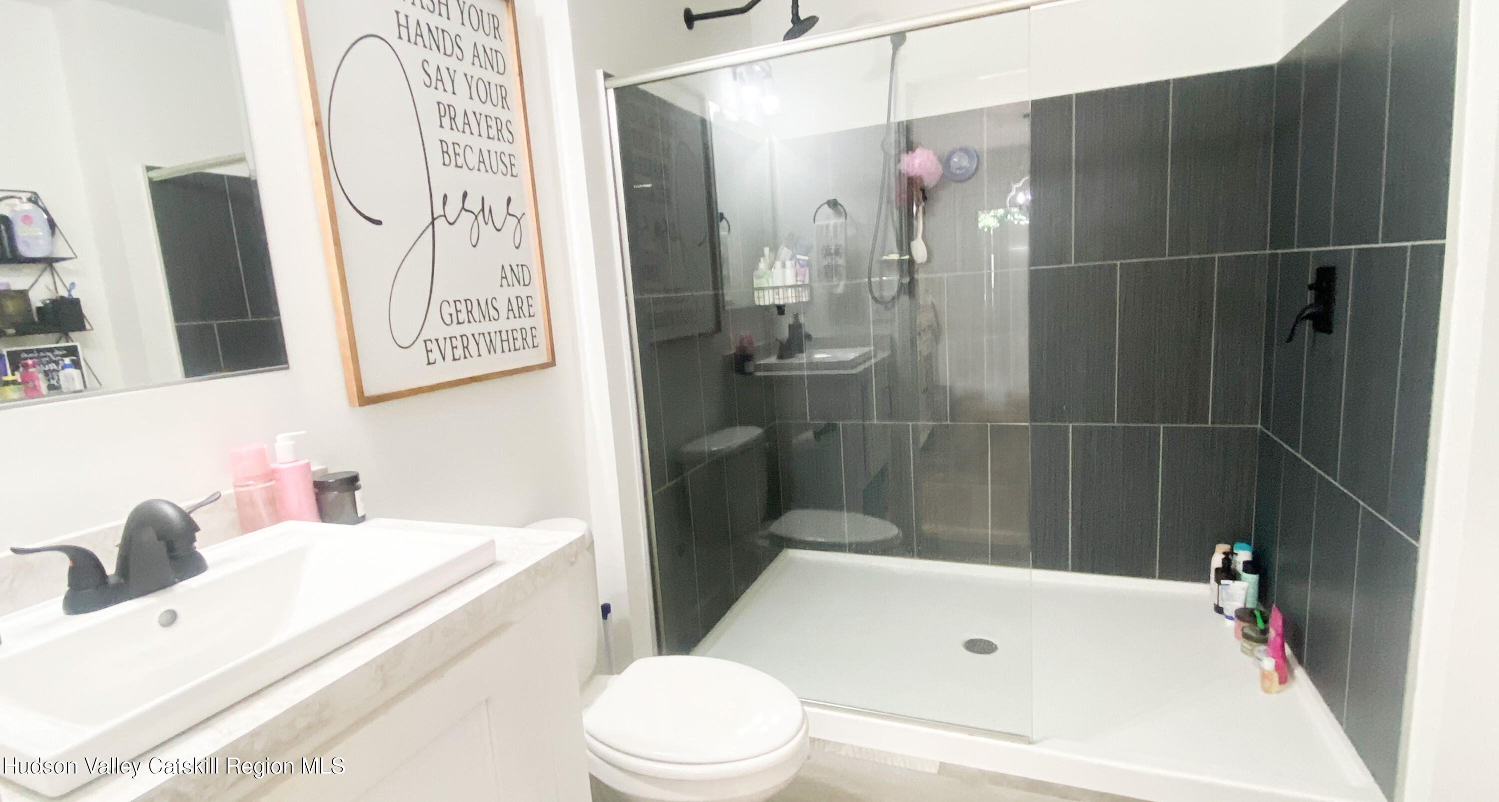 241 Upper North Road Highland, NY 12528 - Photo 18 of 25 a bathroom with a sink a toilet and shower