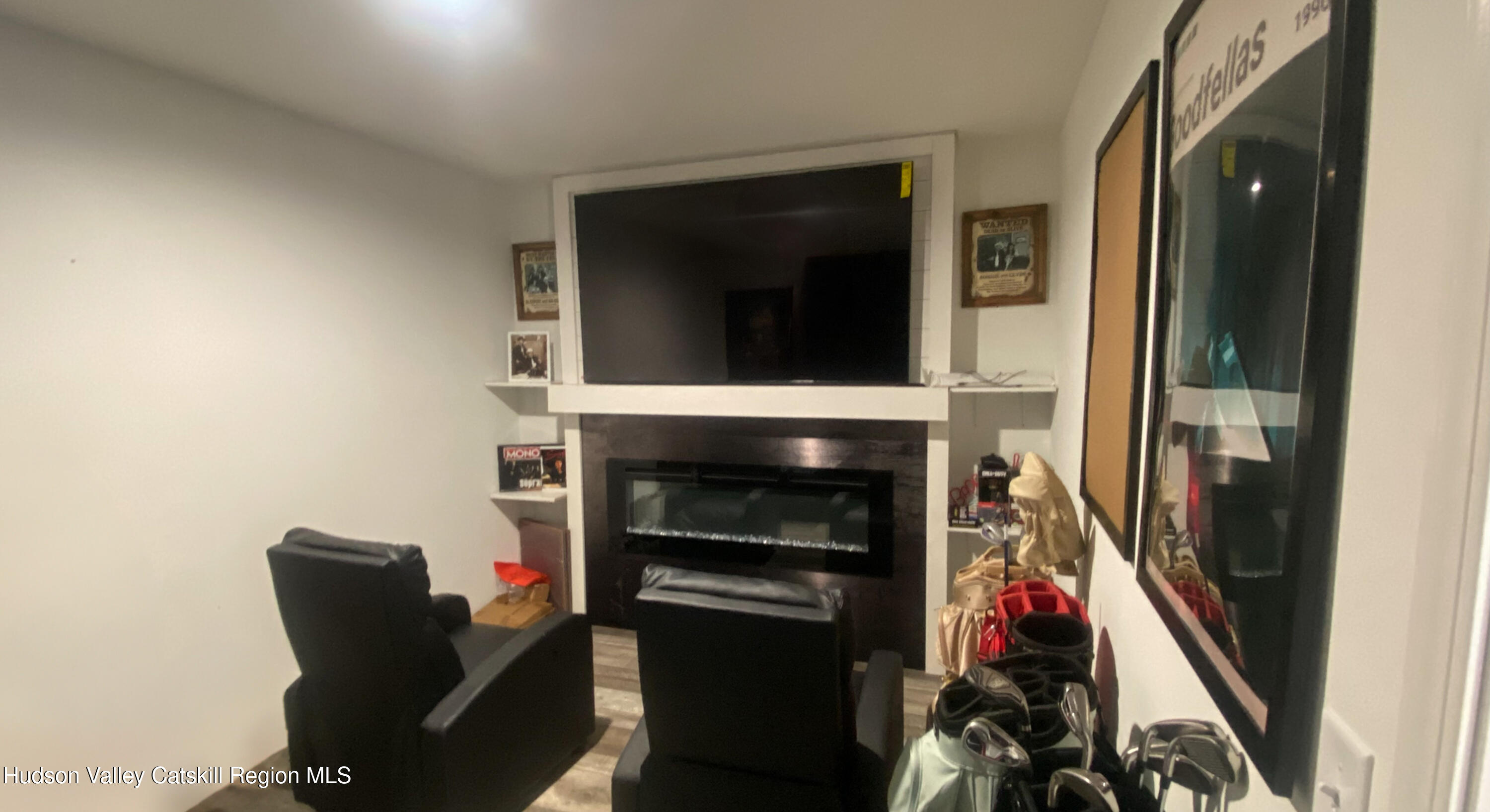 241 Upper North Road Highland, NY 12528 - Photo 20 of 25 a living room with furniture and a fireplace