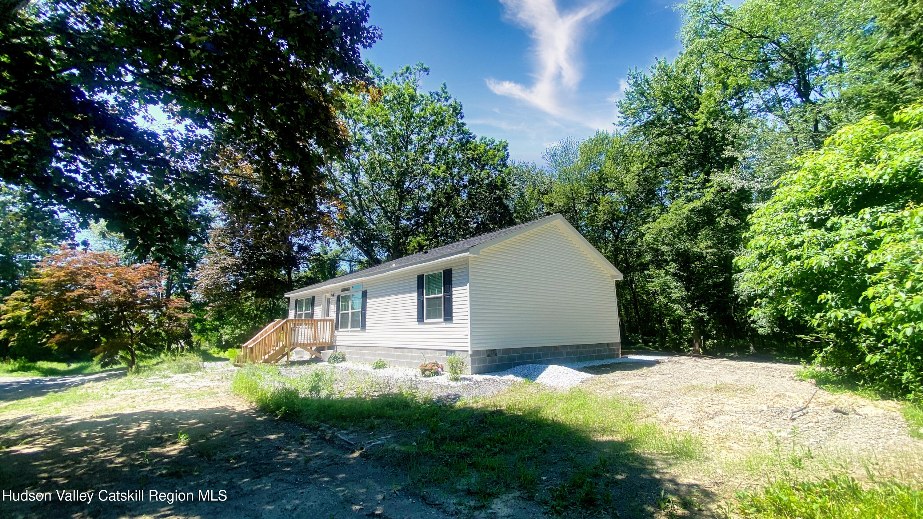241 Upper North Road Highland, NY 12528 - Photo 2 of 25 a view of a backyard with plants and large trees