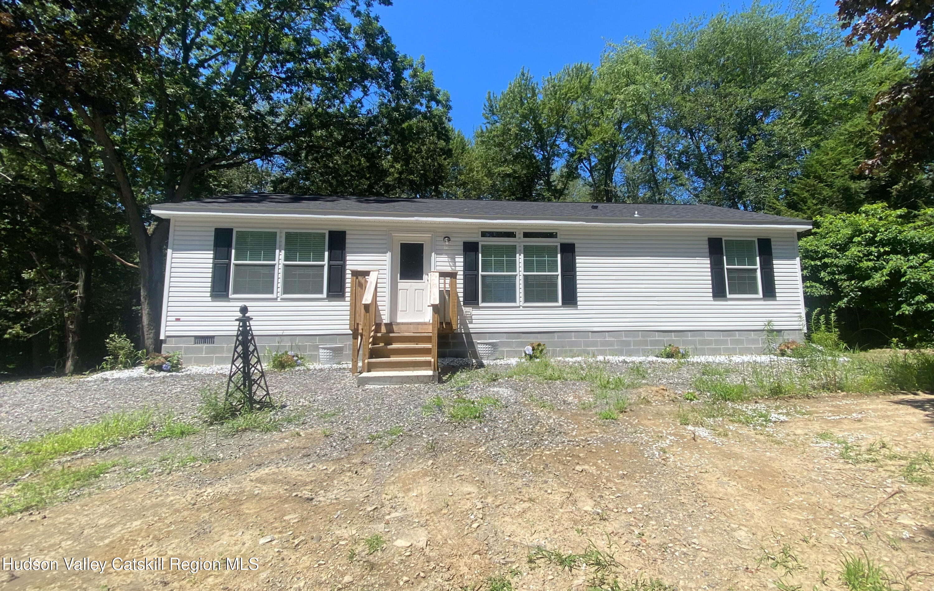 241 Upper North Road Highland, NY 12528 - Photo 21 of 25 front view of a house with a yard