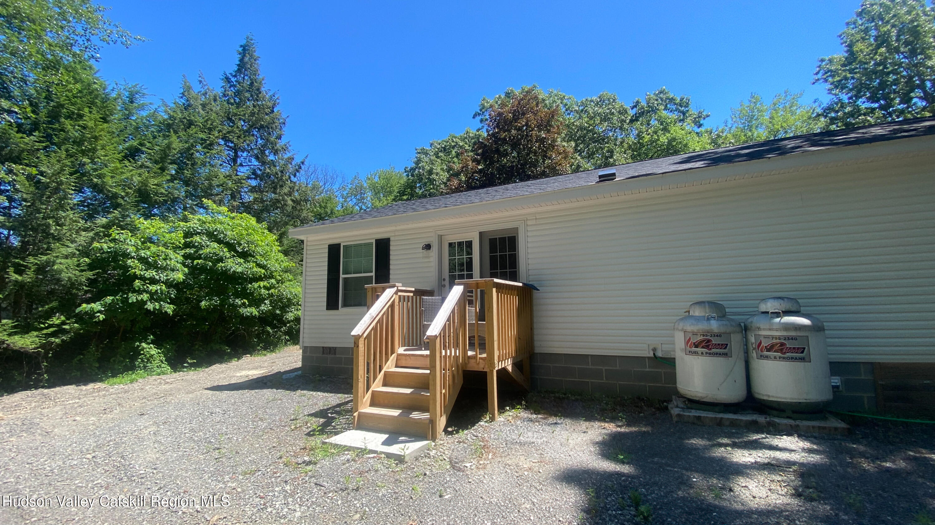 241 Upper North Road Highland, NY 12528 - Photo 23 of 25 a view of a chair and table in backyard of the house