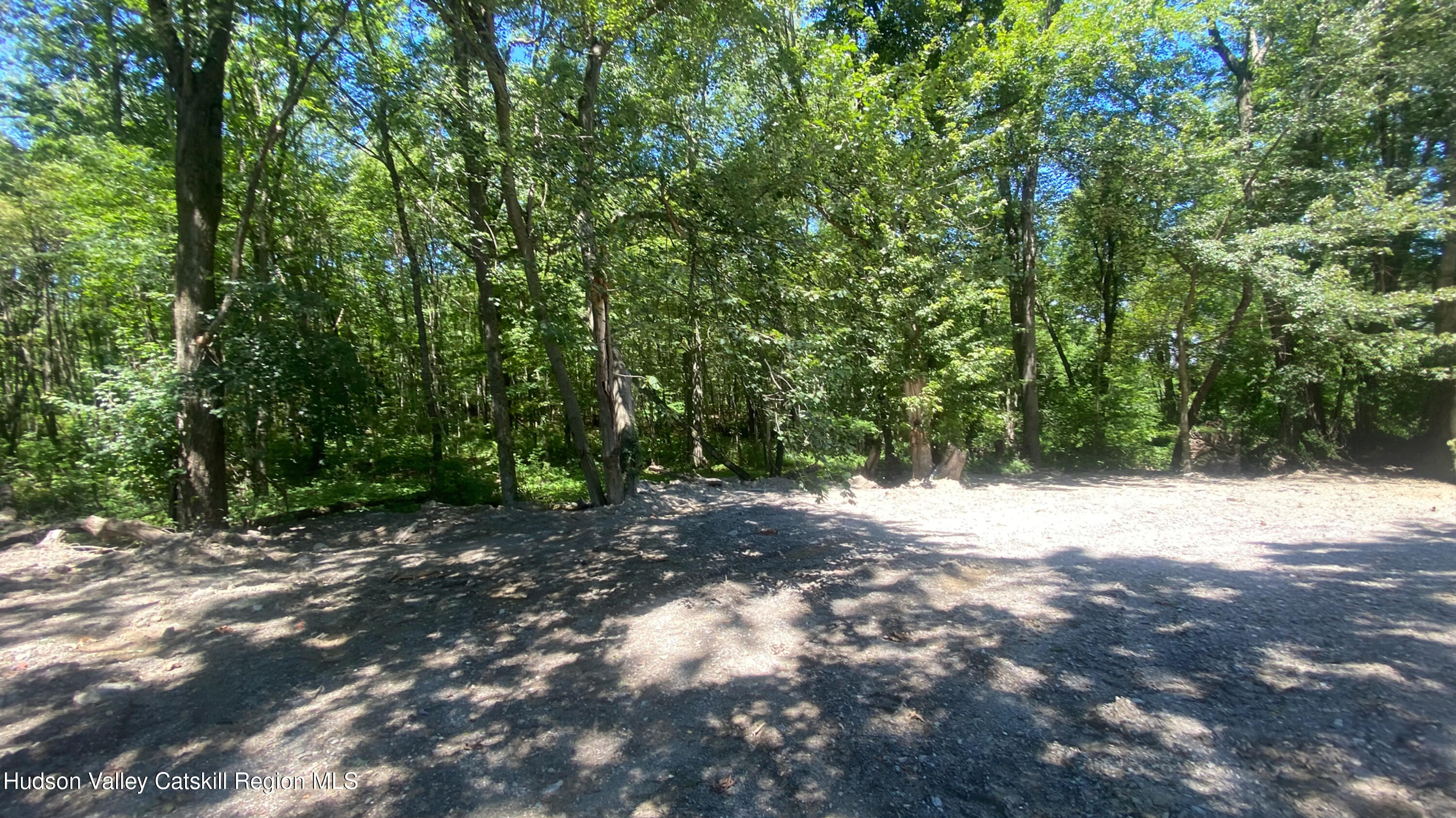 241 Upper North Road Highland, NY 12528 - Photo 25 of 25 a view of a dirt road with trees in the background