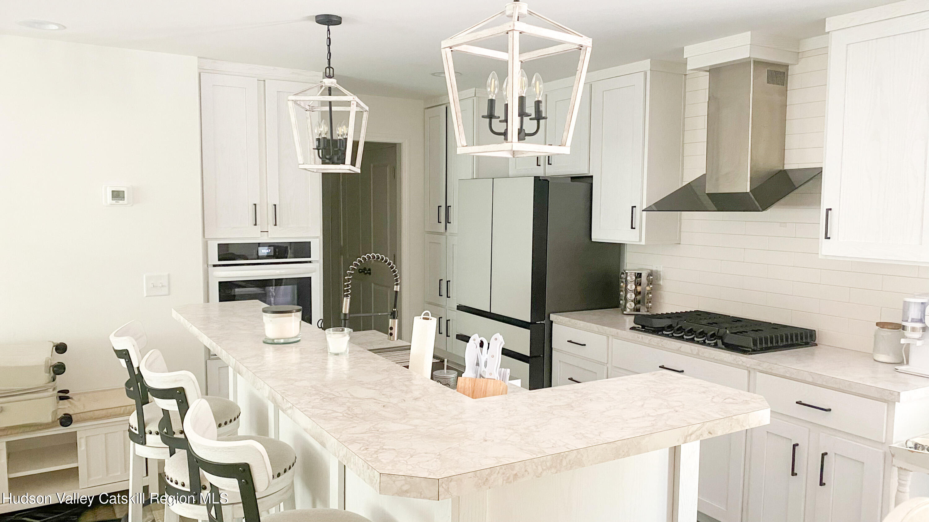 241 Upper North Road Highland, NY 12528 - Photo 5 of 25 a kitchen with stainless steel appliances kitchen island granite countertop a sink and cabinets