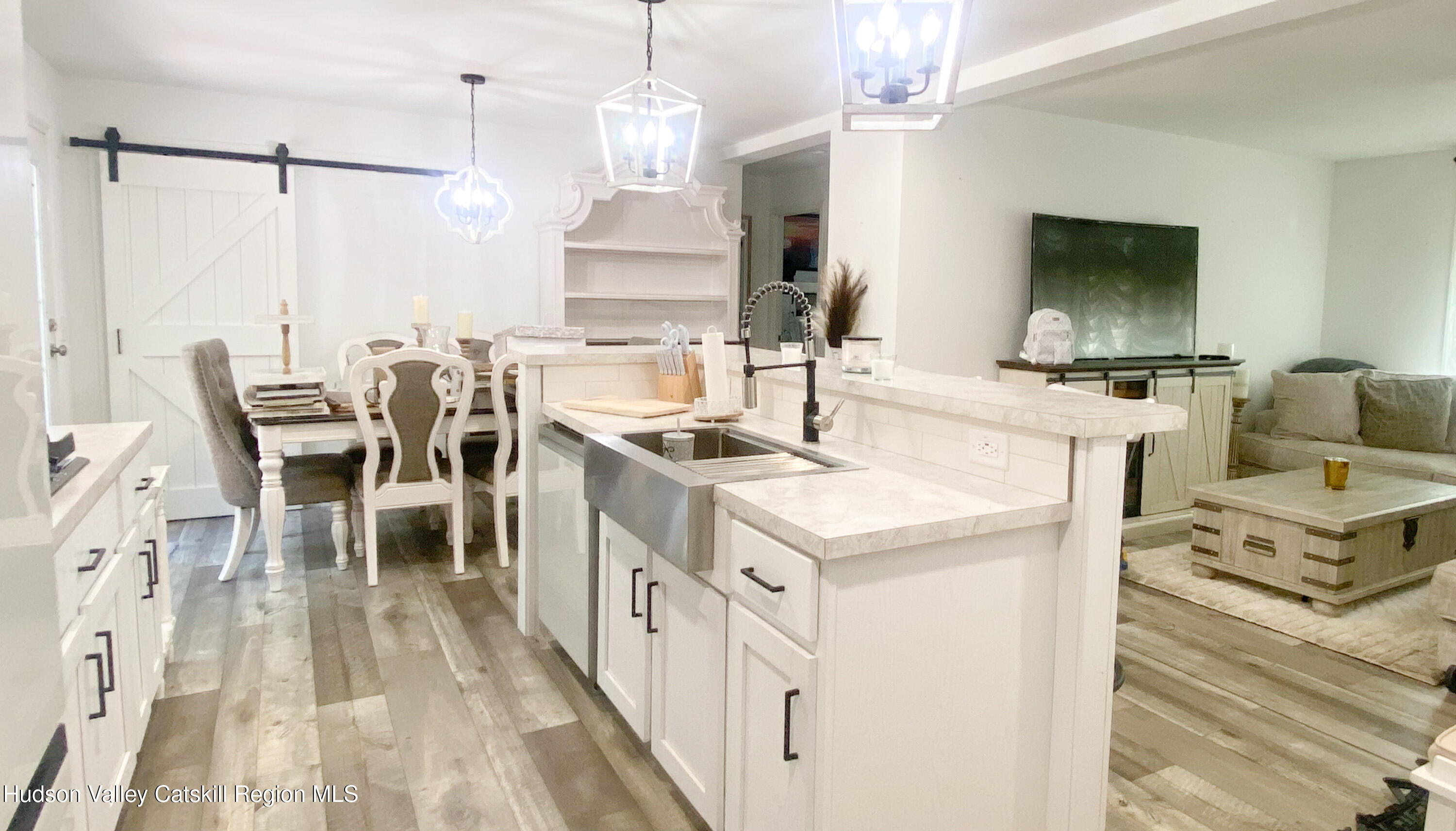 241 Upper North Road Highland, NY 12528 - Photo 8 of 25 a kitchen with stainless steel appliances kitchen island granite countertop a sink and a stove