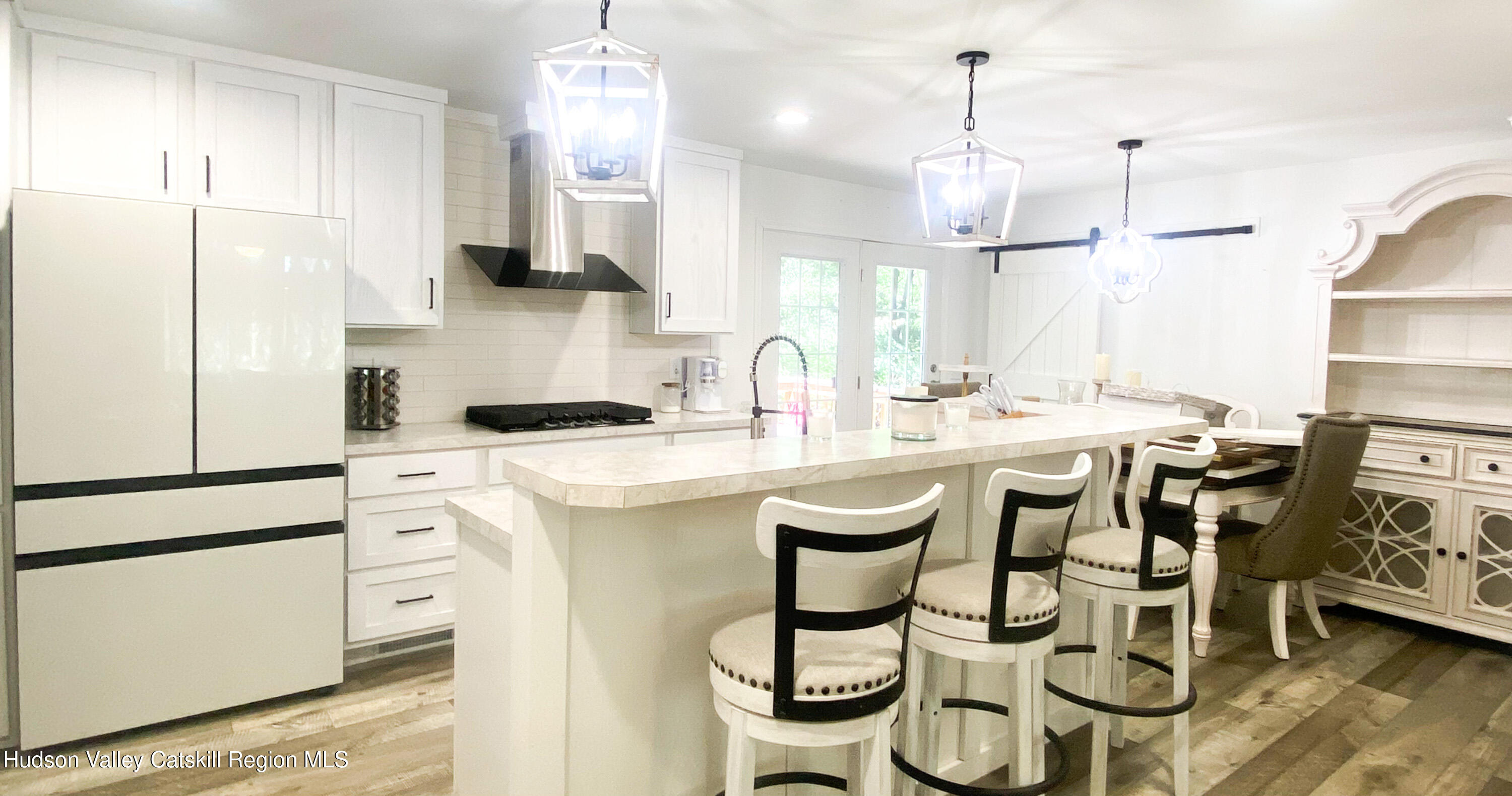 241 Upper North Road Highland, NY 12528 - Photo 9 of 25 a kitchen with stainless steel appliances kitchen island granite countertop a sink a stove and a refrigerator